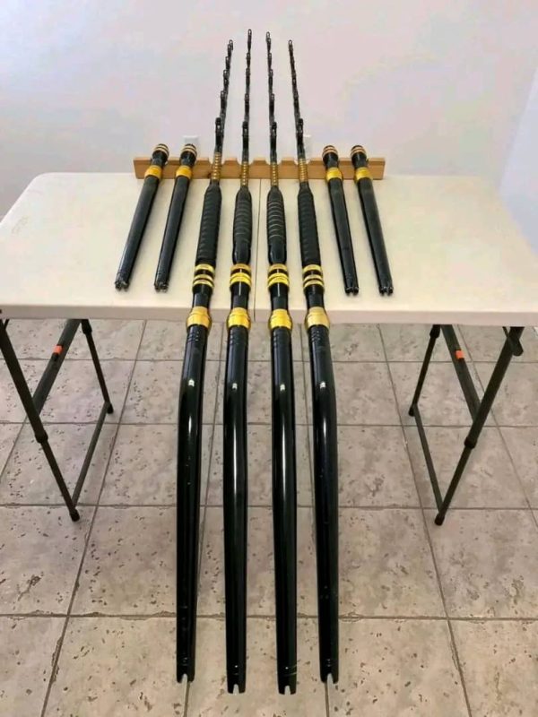4 80lb Penn rods with rollers top to bottom