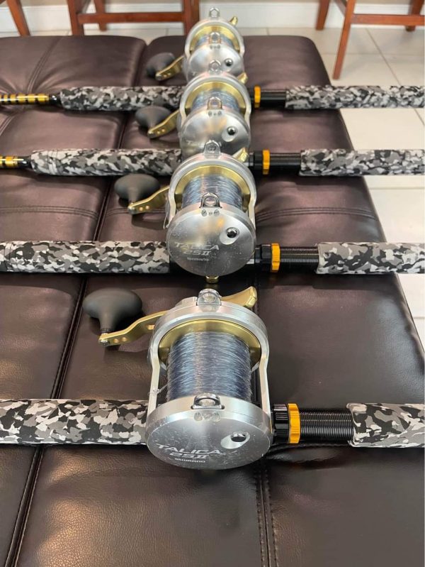 4 Shimano Talica 25II 2 speed reels and rods - Image 2